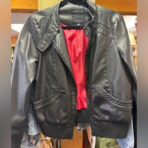 Good used condition, faux leather jacket, women’s size L.